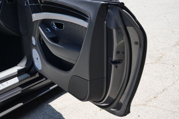 anthracite 6k-mile 2021 Bentley Continental GT W12 sold by Sandbox Motors