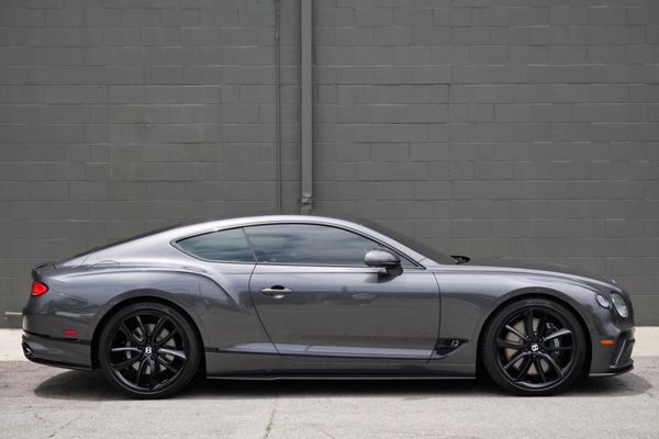 anthracite 6k-mile 2021 Bentley Continental GT W12 sold by Sandbox Motors