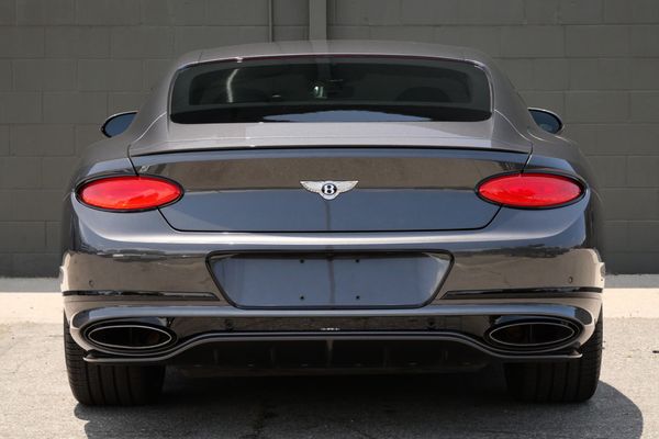 anthracite 6k-mile 2021 Bentley Continental GT W12 sold by Sandbox Motors