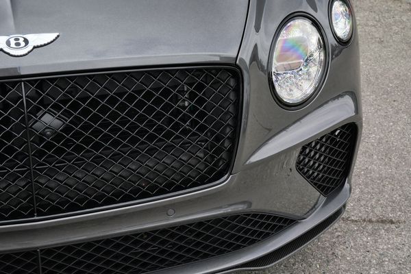 anthracite 6k-mile 2021 Bentley Continental GT W12 sold by Sandbox Motors