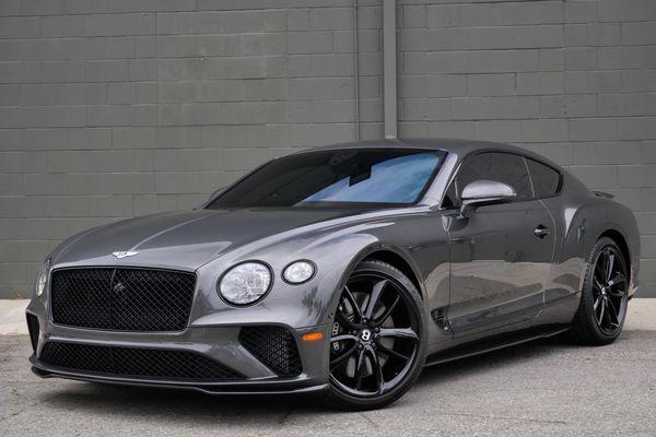 anthracite 6k-mile 2021 Bentley Continental GT W12 sold by Sandbox Motors