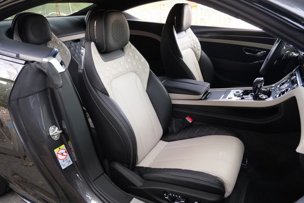 anthracite 6k-mile 2021 Bentley Continental GT W12 sold by Sandbox Motors