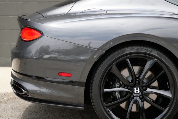anthracite 6k-mile 2021 Bentley Continental GT W12 sold by Sandbox Motors