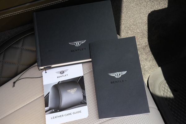 anthracite 6k-mile 2021 Bentley Continental GT W12 sold by Sandbox Motors