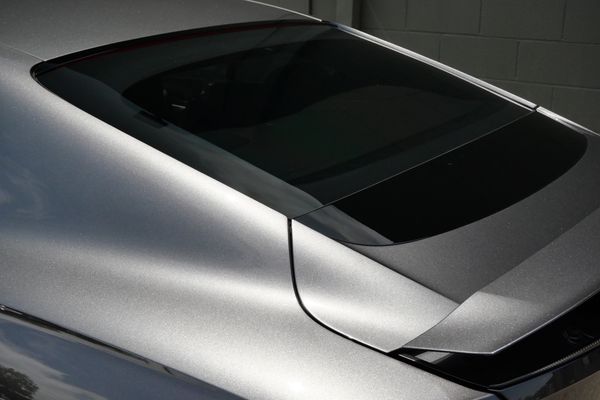 anthracite 6k-mile 2021 Bentley Continental GT W12 sold by Sandbox Motors