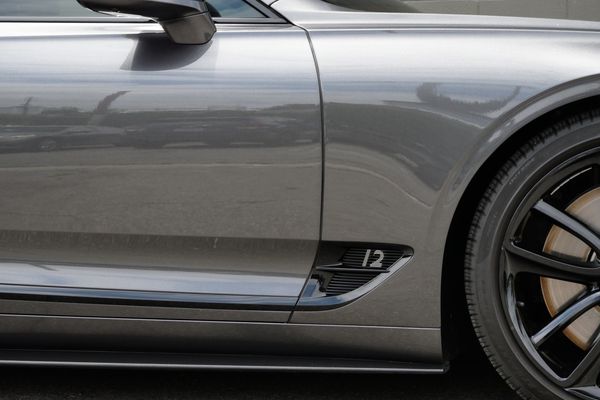anthracite 6k-mile 2021 Bentley Continental GT W12 sold by Sandbox Motors