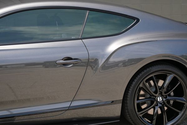 anthracite 6k-mile 2021 Bentley Continental GT W12 sold by Sandbox Motors