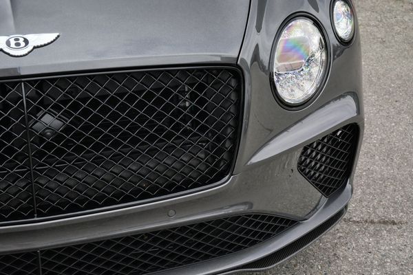 anthracite 6k-mile 2021 Bentley Continental GT W12 sold by Sandbox Motors